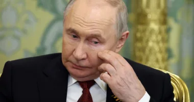 путін