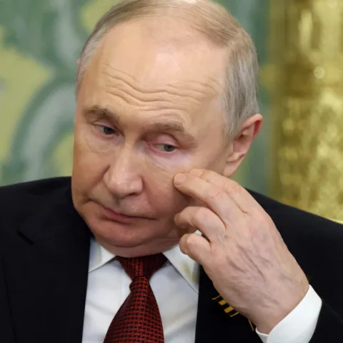 путін